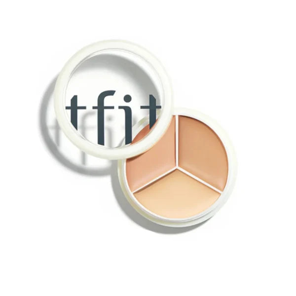 TFIT Cover Up Pro Concealer palette open showing three shades in balm format